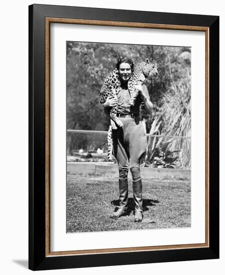 Woman with a Live Leopard around Her Neck-null-Framed Photo