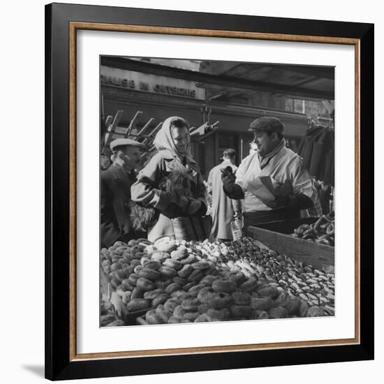 Woman with a Small Terrier Buying Bagels at a Market Stall, Possibly London, C.1945-50-null-Framed Premium Giclee Print