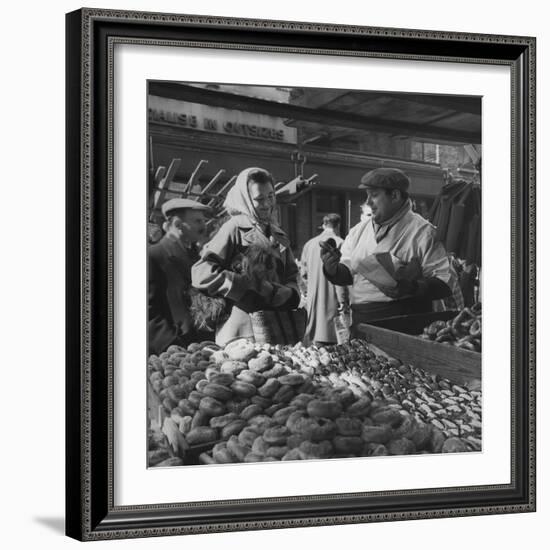 Woman with a Small Terrier Buying Bagels at a Market Stall, Possibly London, C.1945-50-null-Framed Premium Giclee Print