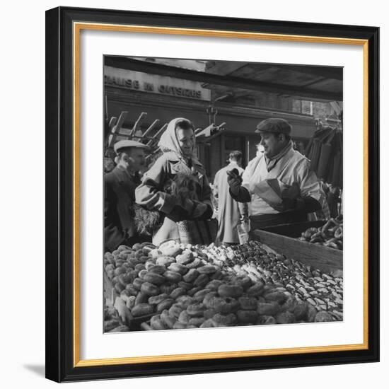 Woman with a Small Terrier Buying Bagels at a Market Stall, Possibly London, C.1945-50-null-Framed Premium Giclee Print