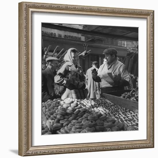 Woman with a Small Terrier Buying Bagels at a Market Stall, Possibly London, C.1945-50-null-Framed Giclee Print