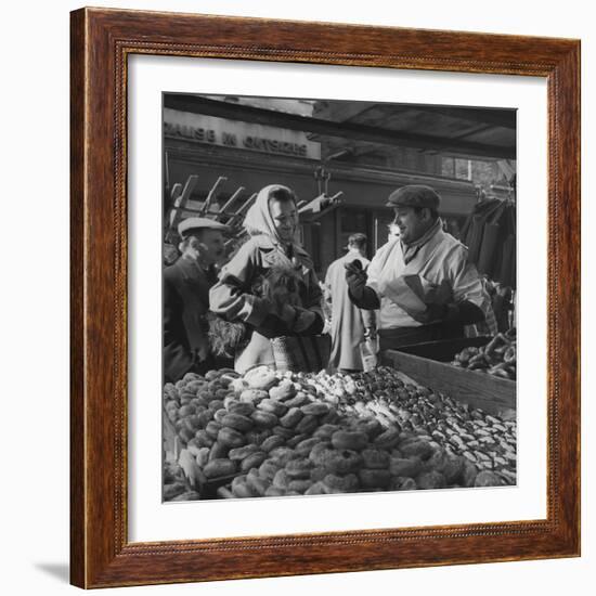 Woman with a Small Terrier Buying Bagels at a Market Stall, Possibly London, C.1945-50-null-Framed Giclee Print