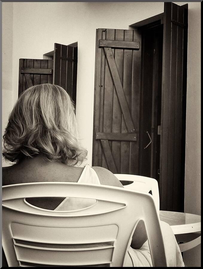 Woman With Blonde Hair Seen From Behind Photographic Print By Tim