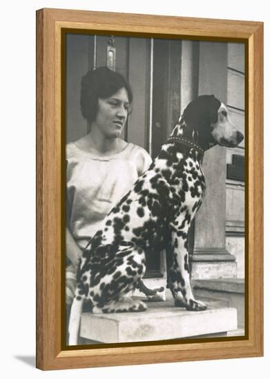 Woman with Dalmatian Outside a House-null-Framed Premier Image Canvas