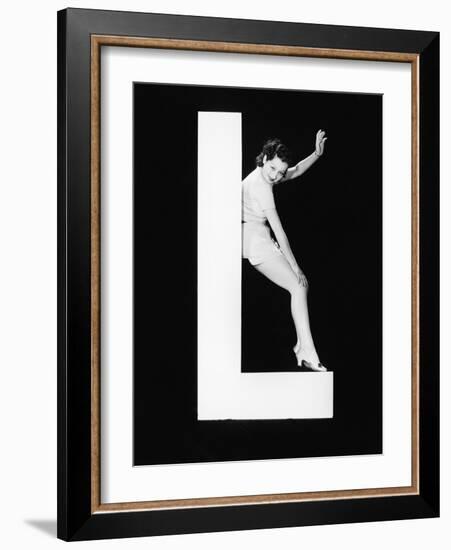 Woman with Huge Letter L-Everett Collection-Framed Photographic Print