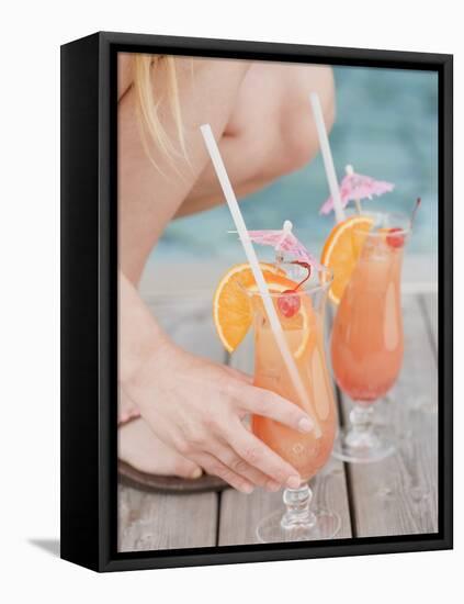 Woman with Planter's Punch by Pool-null-Framed Premier Image Canvas