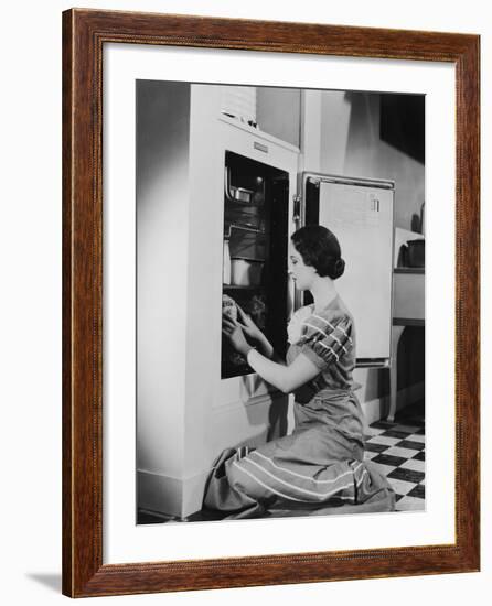 Woman with Refrigerator-null-Framed Photo