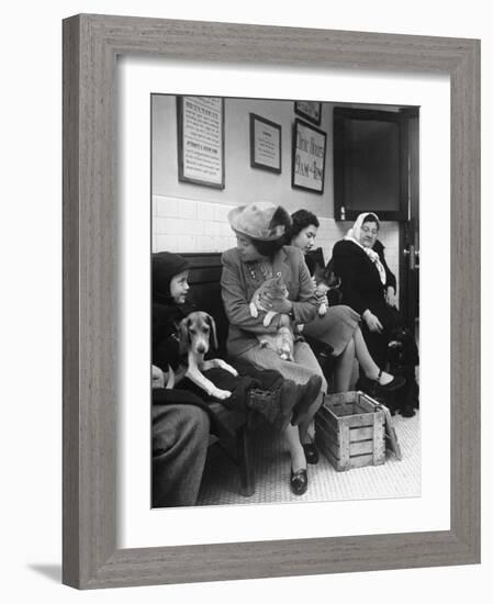 Women and Children Holding Pets While Waiting to See Veterinarian-Nina Leen-Framed Photographic Print