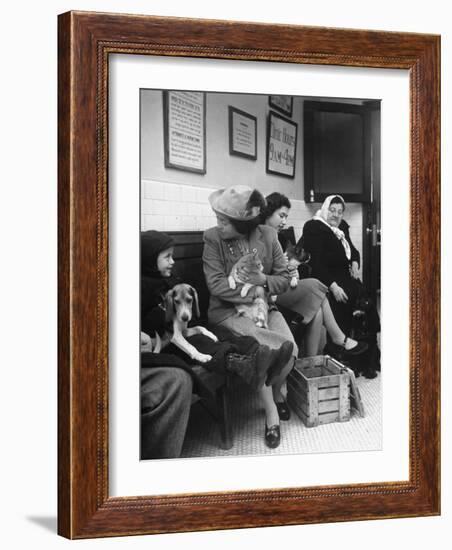 Women and Children Holding Pets While Waiting to See Veterinarian-Nina Leen-Framed Photographic Print