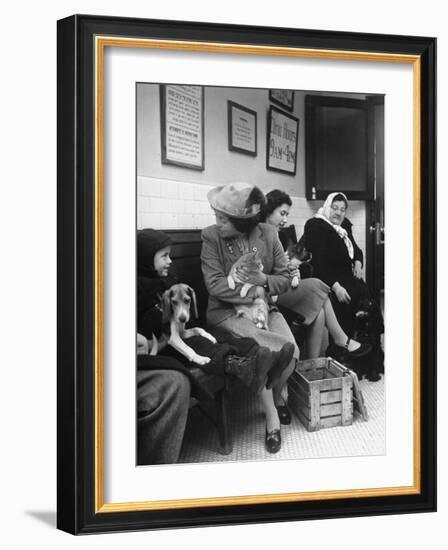 Women and Children Holding Pets While Waiting to See Veterinarian-Nina Leen-Framed Photographic Print