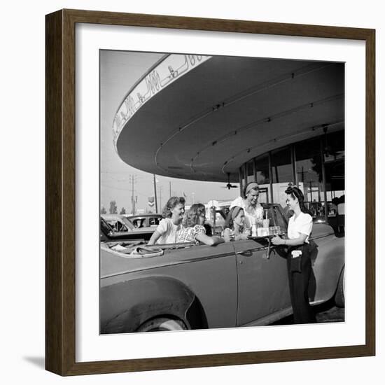 Women and Girls, in Convertible at Drive In, Greet Female Car Hop, Who Just Brought Their Drinks-Nina Leen-Framed Photographic Print