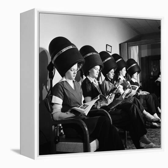 Women Aviation Workers under Hair Dryers in Beauty Salon, North American Aviation's Woodworth Plant-Charles E^ Steinheimer-Framed Premier Image Canvas