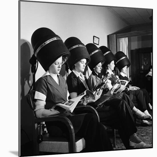 Women Aviation Workers under Hair Dryers in Beauty Salon, North American Aviation's Woodworth Plant-Charles E^ Steinheimer-Mounted Photographic Print
