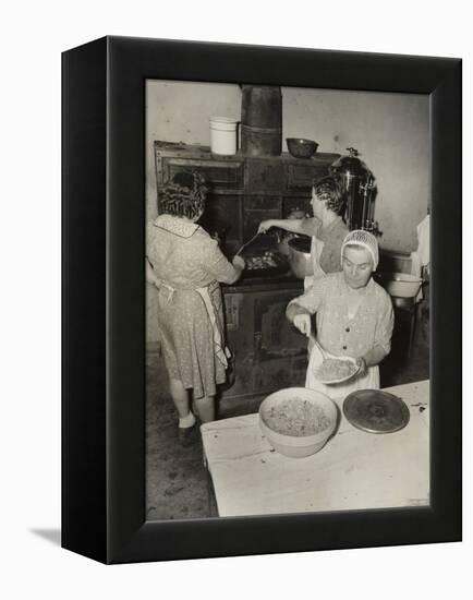 Women Cooking Spaghetti and Frying Chicken on an Old Stove for the Grape Festival-null-Framed Stretched Canvas