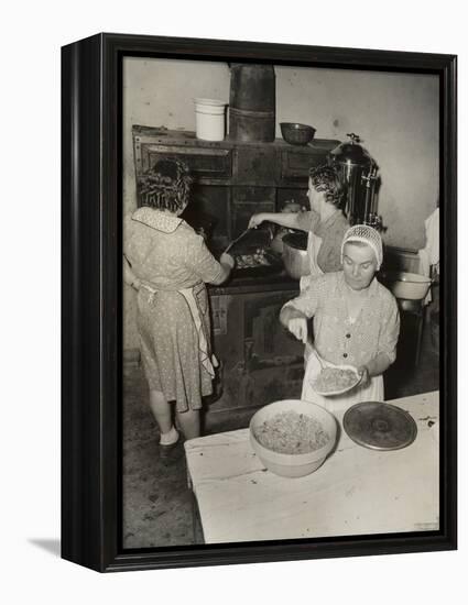 Women Cooking Spaghetti and Frying Chicken on an Old Stove for the Grape Festival-null-Framed Stretched Canvas