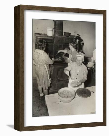 Women Cooking Spaghetti and Frying Chicken on an Old Stove for the Grape Festival-null-Framed Photo