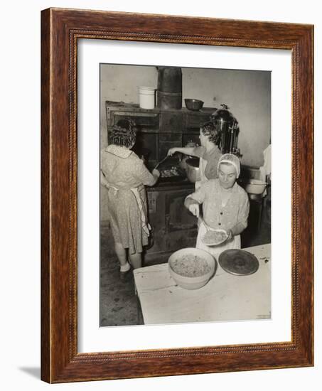 Women Cooking Spaghetti and Frying Chicken on an Old Stove for the Grape Festival-null-Framed Photo