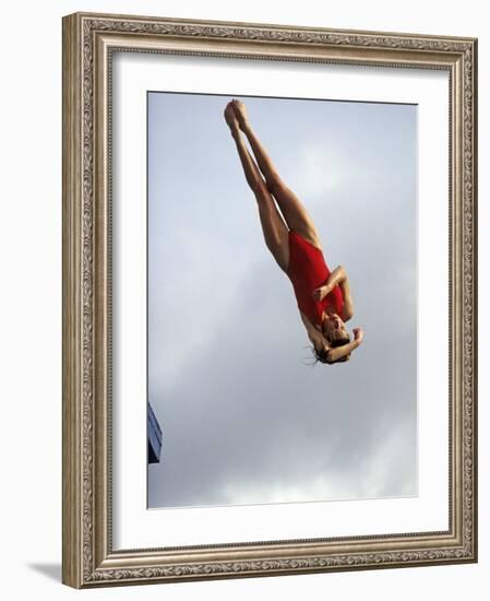 Women Diver Flying Through the Air, California, USA-Paul Sutton-Framed Photographic Print