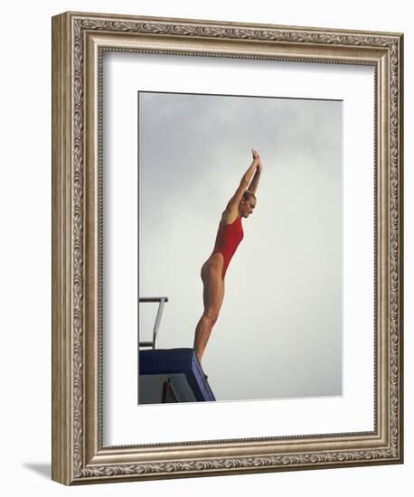 Women Diver Preparing to Jump Off the Platform, California, USA-Paul Sutton-Framed Photographic Print