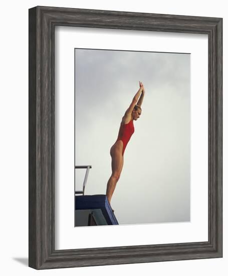 Women Diver Preparing to Jump Off the Platform, California, USA-Paul Sutton-Framed Photographic Print