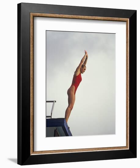 Women Diver Preparing to Jump Off the Platform, California, USA-Paul Sutton-Framed Photographic Print