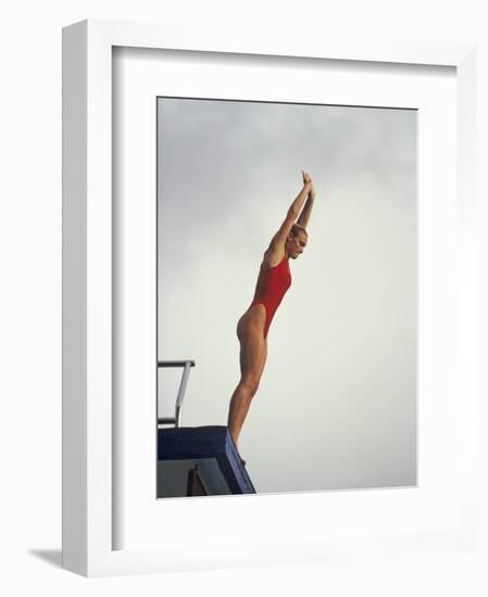 Women Diver Preparing to Jump Off the Platform, California, USA-Paul Sutton-Framed Photographic Print