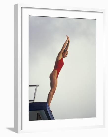 Women Diver Preparing to Jump Off the Platform, California, USA-Paul Sutton-Framed Photographic Print