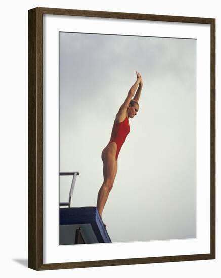 Women Diver Preparing to Jump Off the Platform, California, USA-Paul Sutton-Framed Photographic Print