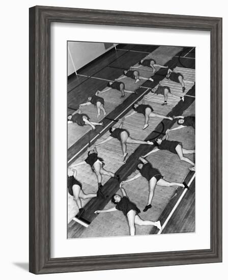 Women Doing Calisthenics to Music in Exercise Class in the Gymnasium of Riverside Church-Margaret Bourke-White-Framed Photographic Print