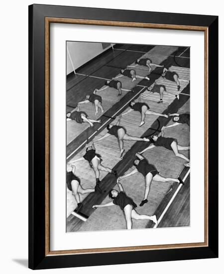 Women Doing Calisthenics to Music in Exercise Class in the Gymnasium of Riverside Church-Margaret Bourke-White-Framed Photographic Print