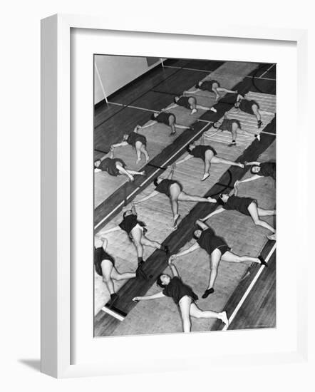 Women Doing Calisthenics to Music in Exercise Class in the Gymnasium of Riverside Church-Margaret Bourke-White-Framed Photographic Print