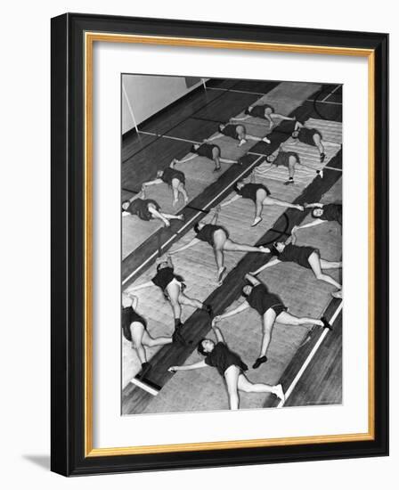 Women Doing Calisthenics to Music in Exercise Class in the Gymnasium of Riverside Church-Margaret Bourke-White-Framed Photographic Print