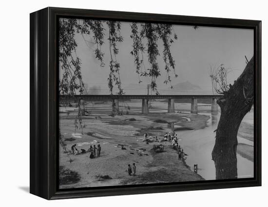 Women Doing Their Laundry at the River Bank-John Florea-Framed Premier Image Canvas