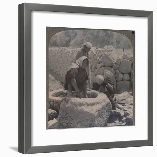 'Women drawing water at the Fountain of the Magi, on the road to Bethlehem', c1900-Unknown-Framed Photographic Print