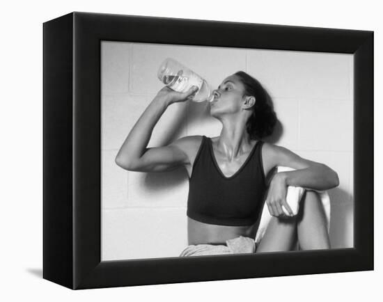 Women Drinking after Exercise Session in Fitness Studio, New York, New York, USA-Paul Sutton-Framed Premier Image Canvas