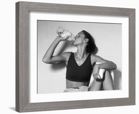 Women Drinking after Exercise Session in Fitness Studio, New York, New York, USA-Paul Sutton-Framed Photographic Print