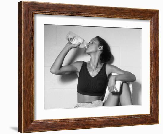 Women Drinking after Exercise Session in Fitness Studio, New York, New York, USA-Paul Sutton-Framed Photographic Print