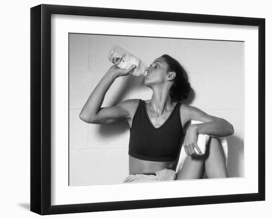 Women Drinking after Exercise Session in Fitness Studio, New York, New York, USA-Paul Sutton-Framed Photographic Print