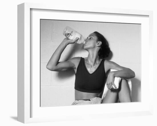 Women Drinking after Exercise Session in Fitness Studio, New York, New York, USA-Paul Sutton-Framed Photographic Print