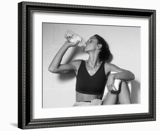 Women Drinking after Exercise Session in Fitness Studio, New York, New York, USA-Paul Sutton-Framed Photographic Print