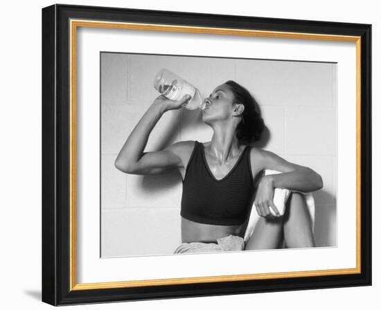 Women Drinking after Exercise Session in Fitness Studio, New York, New York, USA-Paul Sutton-Framed Photographic Print