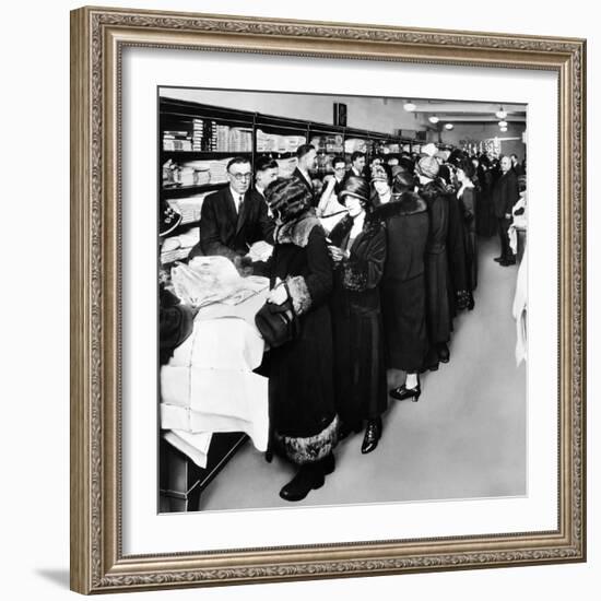 Women Eagerly Shop across the Counter at a Newly Opened Sears Retail Store-null-Framed Photo