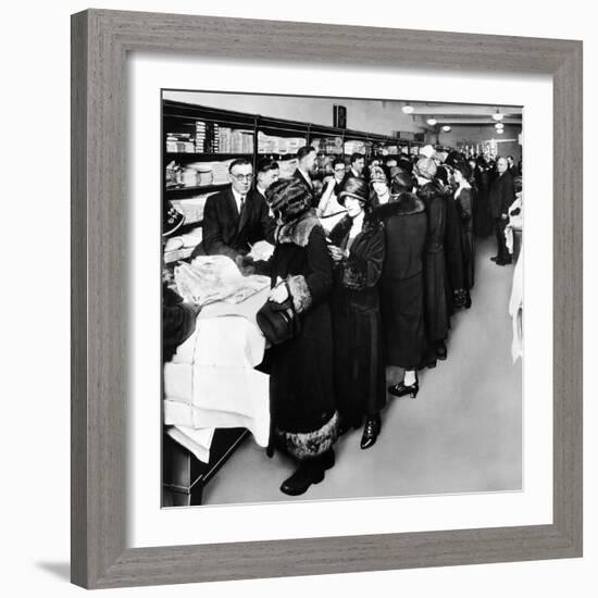 Women Eagerly Shop across the Counter at a Newly Opened Sears Retail Store-null-Framed Photo