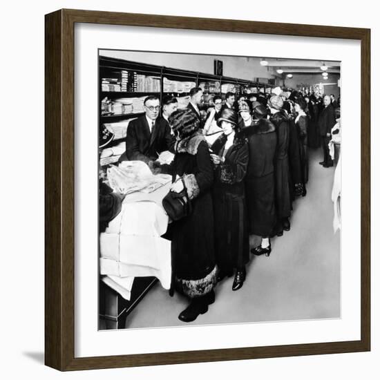 Women Eagerly Shop across the Counter at a Newly Opened Sears Retail Store-null-Framed Photo