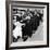 Women Eagerly Shop across the Counter at a Newly Opened Sears Retail Store-null-Framed Photo