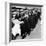 Women Eagerly Shop across the Counter at a Newly Opened Sears Retail Store-null-Framed Photo