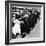 Women Eagerly Shop across the Counter at a Newly Opened Sears Retail Store-null-Framed Photo