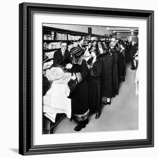 Women Eagerly Shop across the Counter at a Newly Opened Sears Retail Store-null-Framed Photo