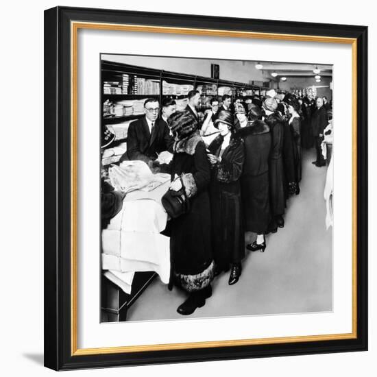 Women Eagerly Shop across the Counter at a Newly Opened Sears Retail Store-null-Framed Photo