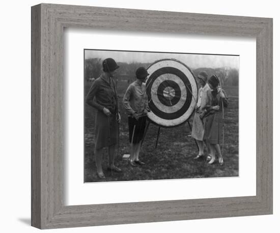 Women examining Archery Target Photograph - Washington, DC-Lantern Press-Framed Art Print